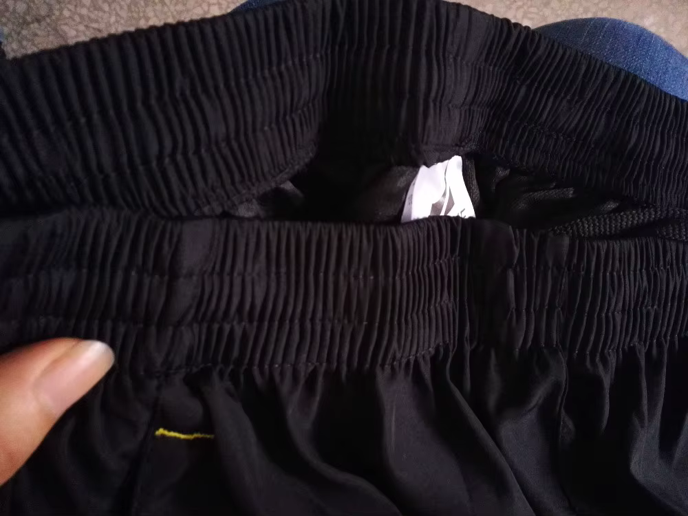 mustade meeste pükste elastne vöökoht