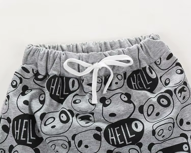 hallid puuvillased püksid panda mustriga ja valge paelaga