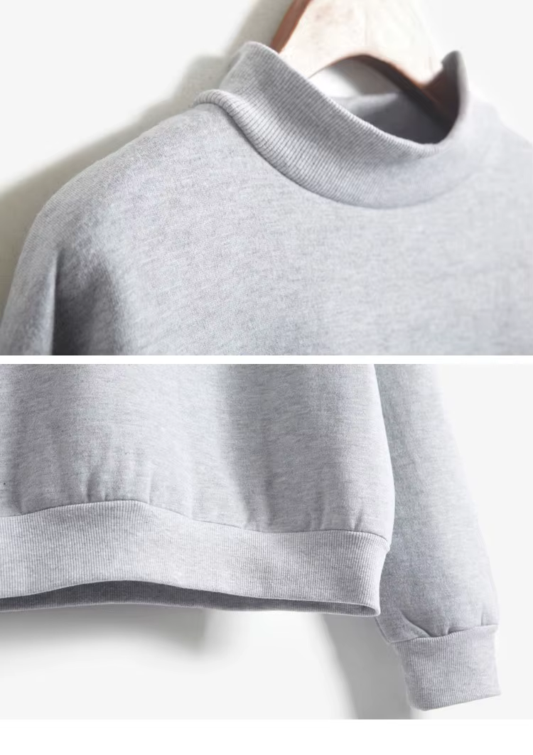 helehall ühevärviline naiste pullover kõrge kaelusega