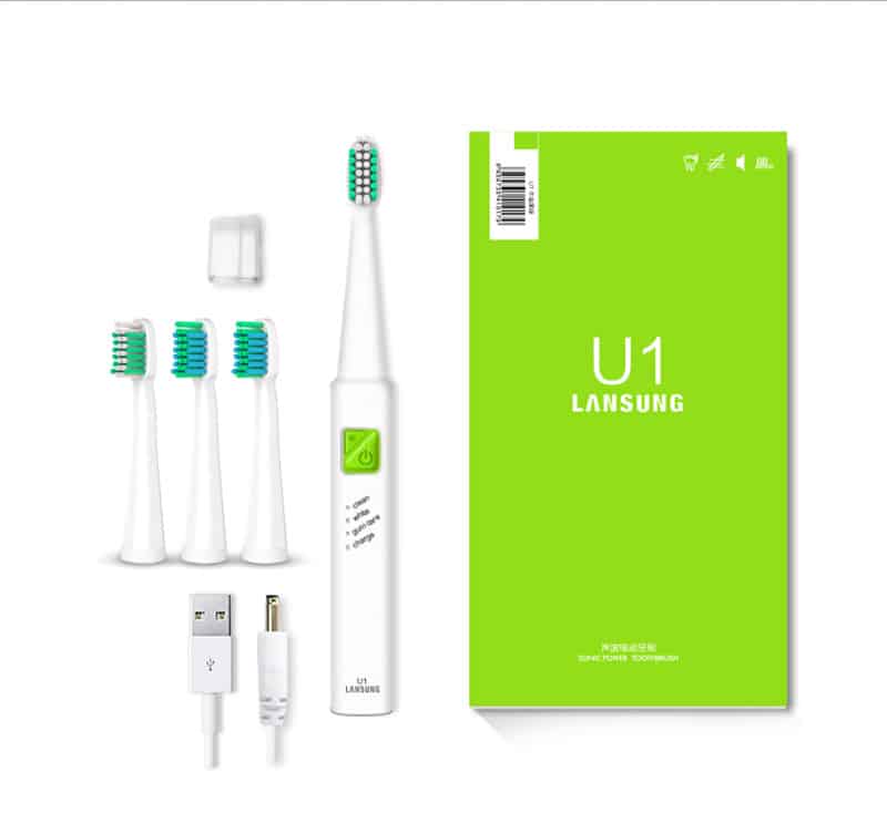valge elektriline hambahari kolme vahetatava otsikuga ja USB laadimiskaabel