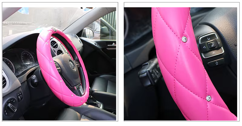 roosa nahkne roolikate kristallidega auto roolil