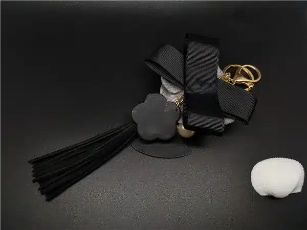 Black&White Male&Female Keychain for Bag Plush Car Key Ring Car Key Pendant Camellia Flower Hat Tassel cc Style Key Chain 24