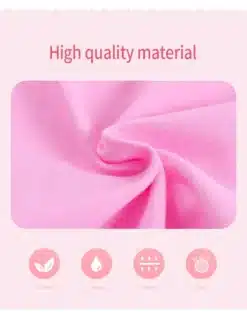 Roosa kõrgekvaliteediline kangas volangidega tantsukleitidele tüdrukutele, detailvaade lähedalt pehme tekstuuriga.