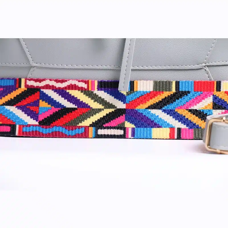 kunstnahast crossbody kott värvilise mustrilise sangaga