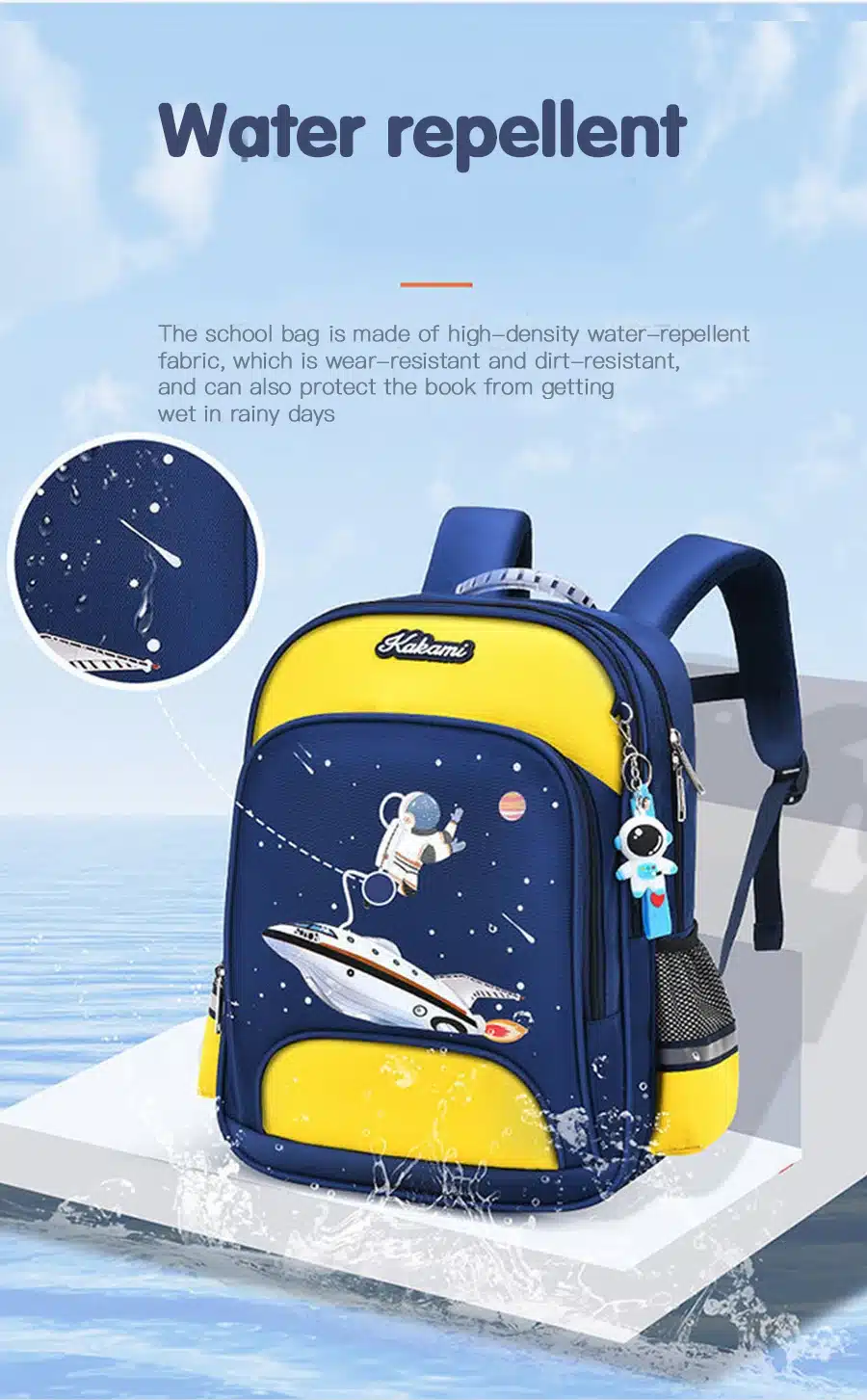 sinine ja kollane seljakott astronaudi ja kosmoselaeva pildiga, veekindel materjal