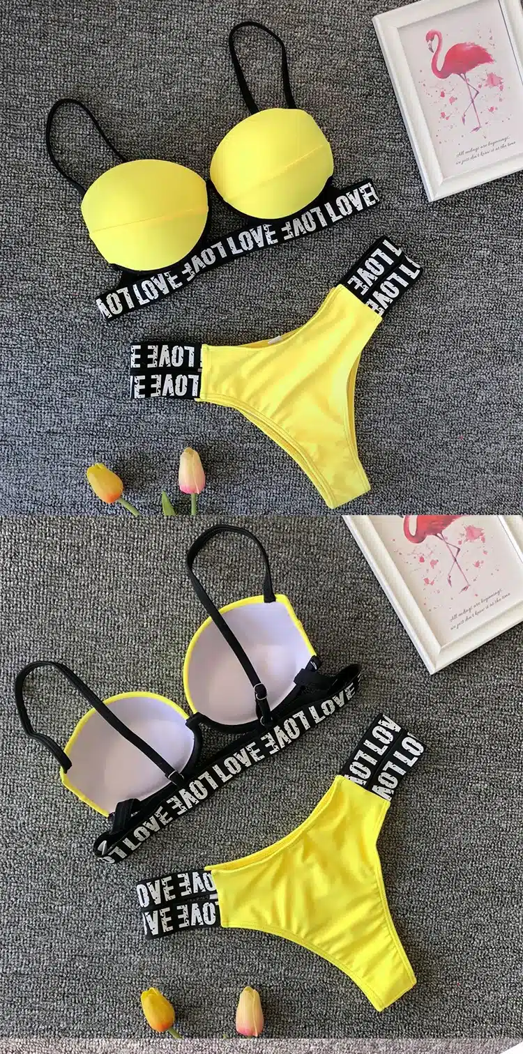 kollased push-up bikiinid mustade rihmade ja kirjadega