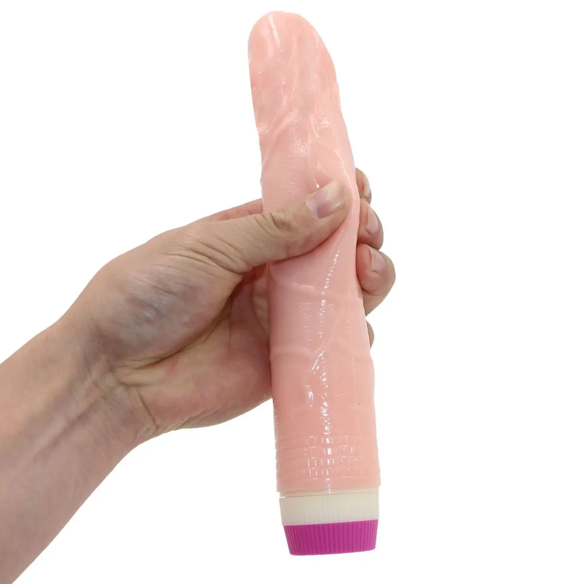 nahavärvi vibreeriv dildo inimese käes