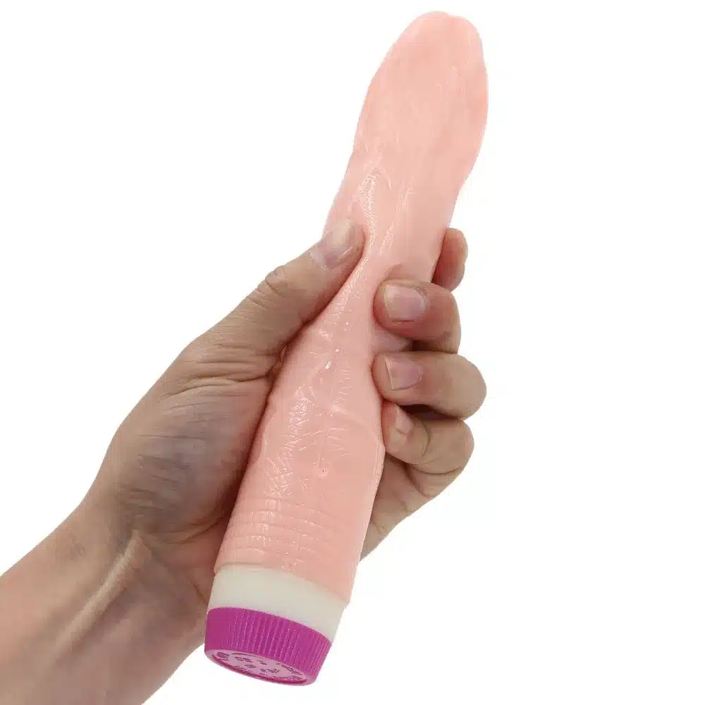 nahavärvi vibreeriv dildo inimese käes