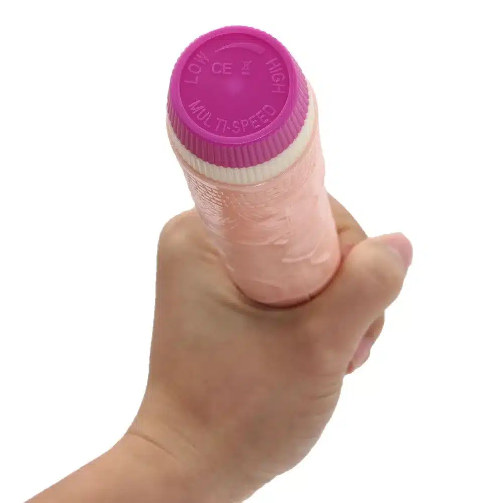 nahavärvi vibreeriv dildo, millel on roosa reguleeritav otsik