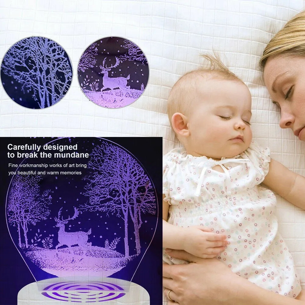 3D efektiga LED lamp, millel on hirve ja puude kujutis, paistab lilla valgusega