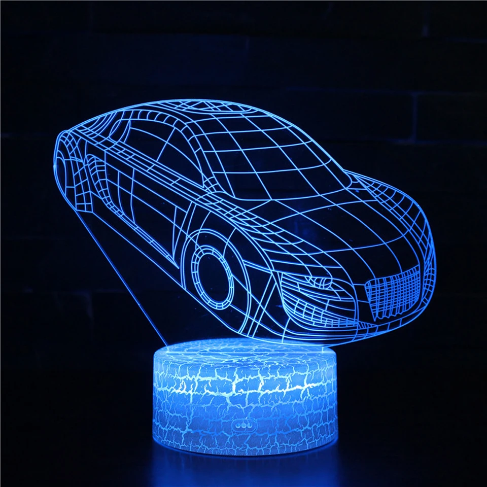 sinine LED öölamp auto kujutisega, mis seisab ümmargusel alusel