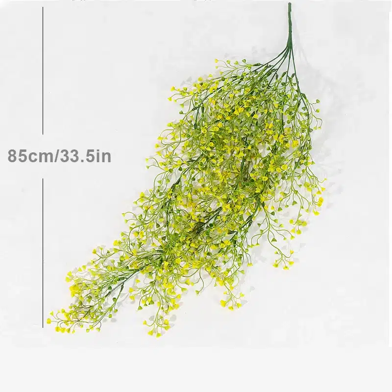 roheline ja kollane kunsttaim, pikkusega 85 cm, millel on väikesed lehed