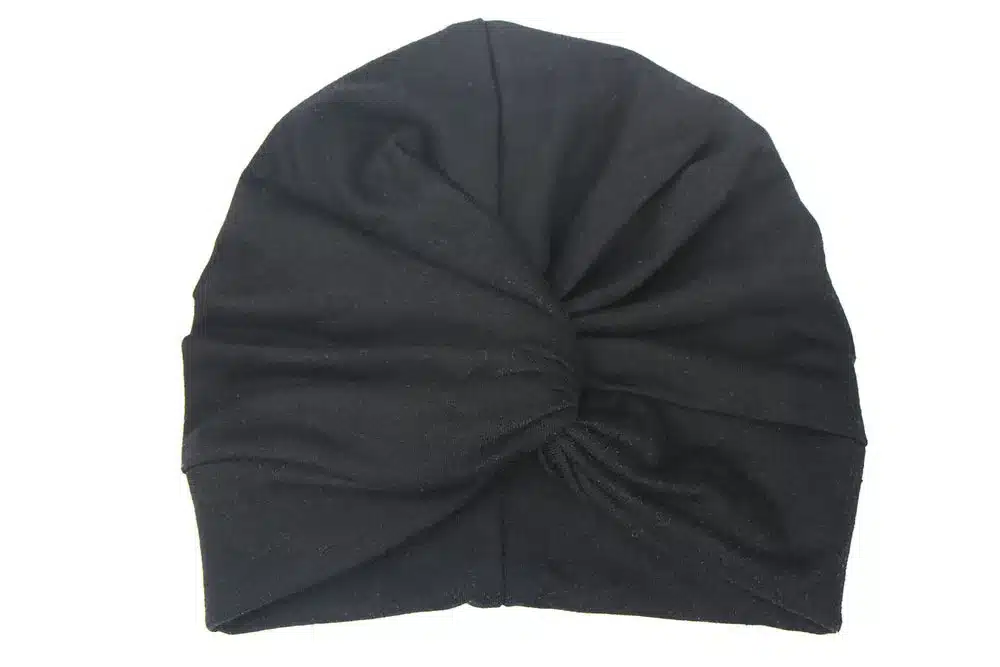 must laste turbanmüts, millel on ees sõlm