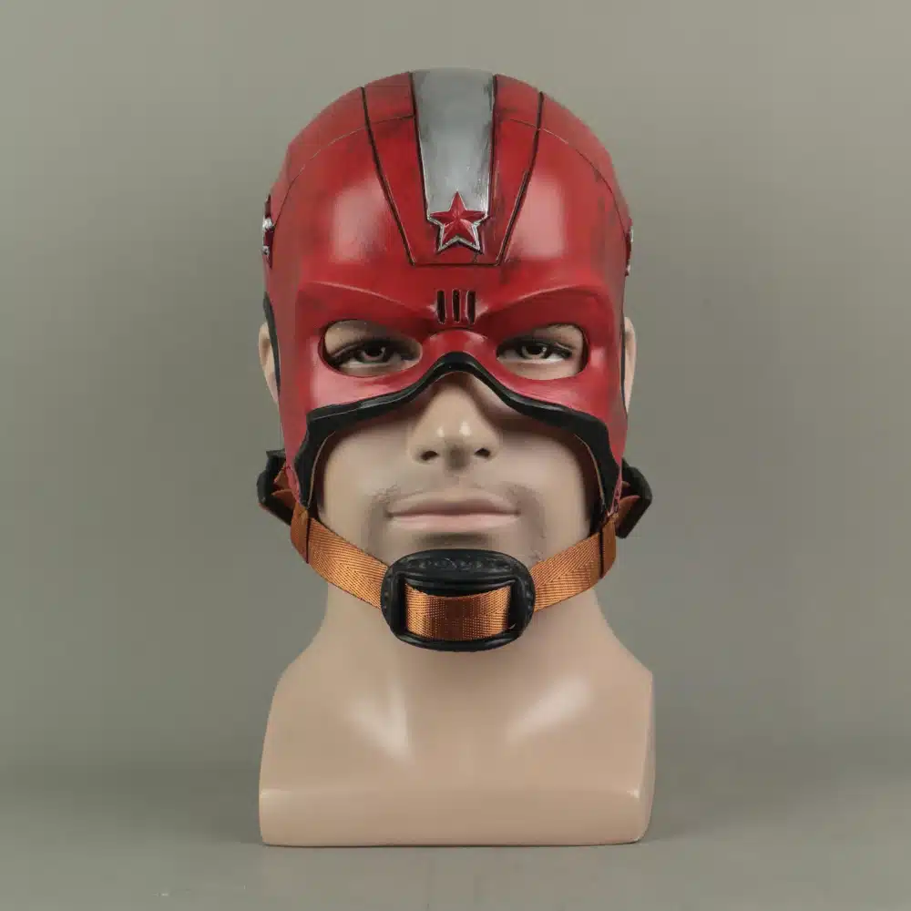 punane mask mustade detailidega ja oranži rihmaga