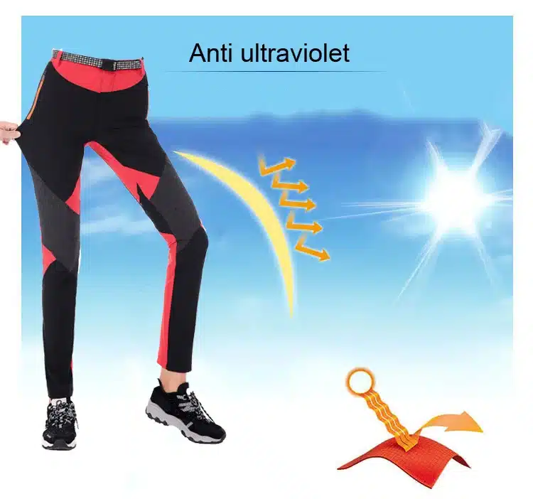 naiste mustad ja punased matkapüksid, millel on UV-kaitse