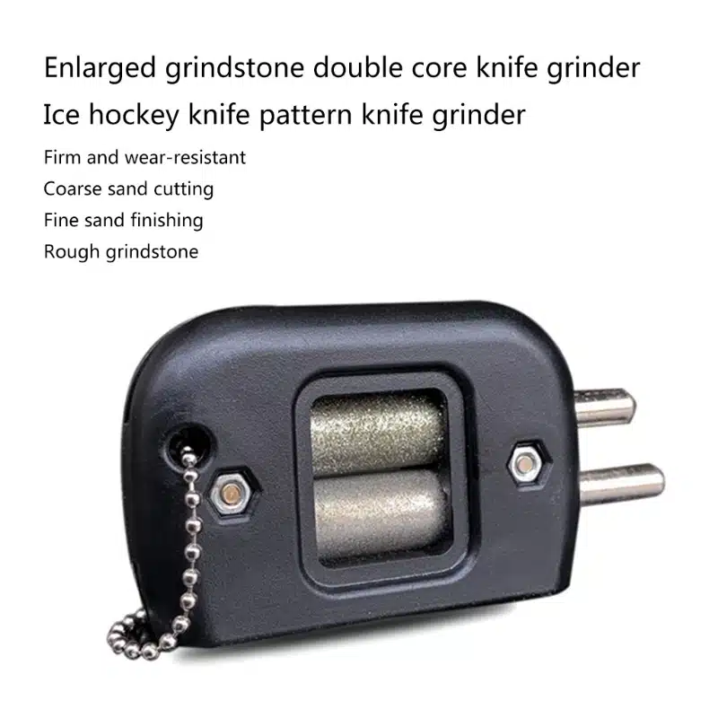 Must plastikust uisuteritaja kahest hallist terasest lihvrattast koosneva südamikuga valgel taustal. Kompaktne ja kaasaskantav disain koos kinnitusahela ja detailsete lihvimispindadega.