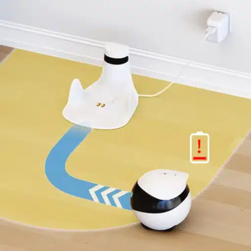 valge ja must robot kaamera laadimisjaama lähedal põrandal