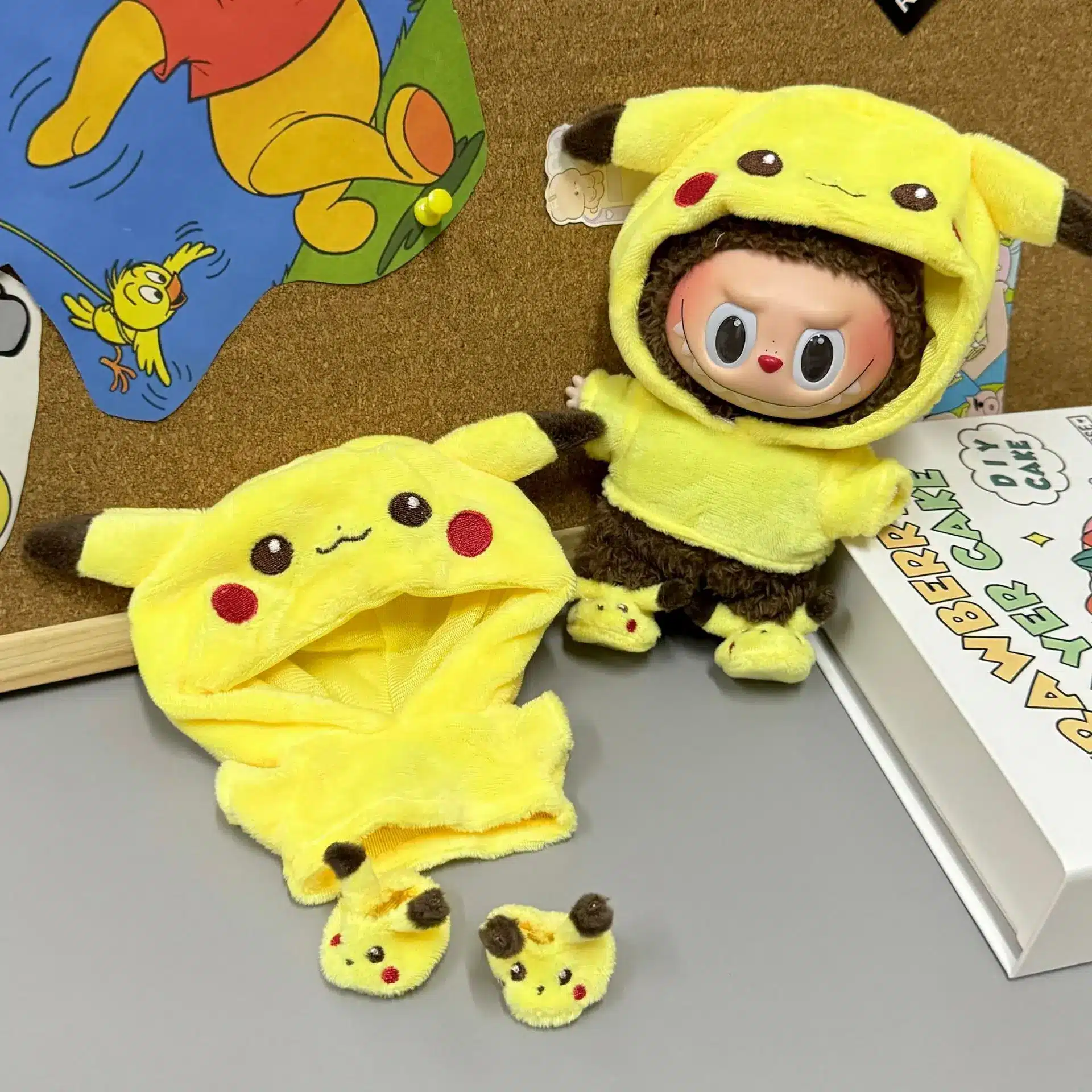 kollane pehme pikachu ülikond väikesele nukule koos kapuutsi ja kõrvadega