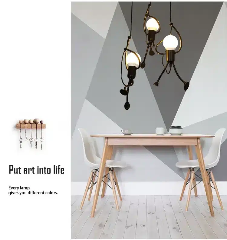 kolm modernset laelampi geomeetrilise mustriga seina taustal