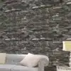 hall kivimustriga tapeet elutoas diivani taga