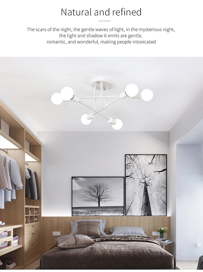 Stiilne valge kuue pirniga laelamp, mis on paigaldatud kaasaegsesse magamistuppa. Laelamp on minimalistliku disainiga, valget värvi ja elegantse metallviimistlusega, samal ajal kui taustal on näha puidust riidekapp ja must-valged kunstiteosed seinal.
