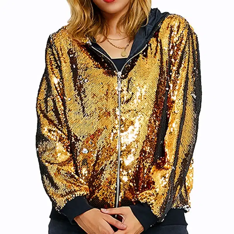 Naistele mõeldud säravate kuldsete litritega jakk, millel on mustad äärised ja lukuga esikinnitus, pakub silmapaistvat stiili retro hõnguga.