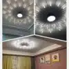 Moodne ja nutikas dimmertatav LED laelühter, millel on elegantsed mustad kiired ja valged LED-torud avaras elutoas. Laelühter paistab silma oma funktsionaalsuse ja stiiliga, pakkudes nii hubast valgust kui ka kaasaegset disaini.