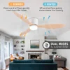Laeventilaatorid led lambi ja puldiga | E-pood Tootemaailm Klaasist lambivarjuga laeventilaator koos puidust labadega, paigaldatud heledasse elutuppa. Ventilaatoril on LED valgustus ja pult. Suvised ja talvised seaded on märgitud noolekestega.