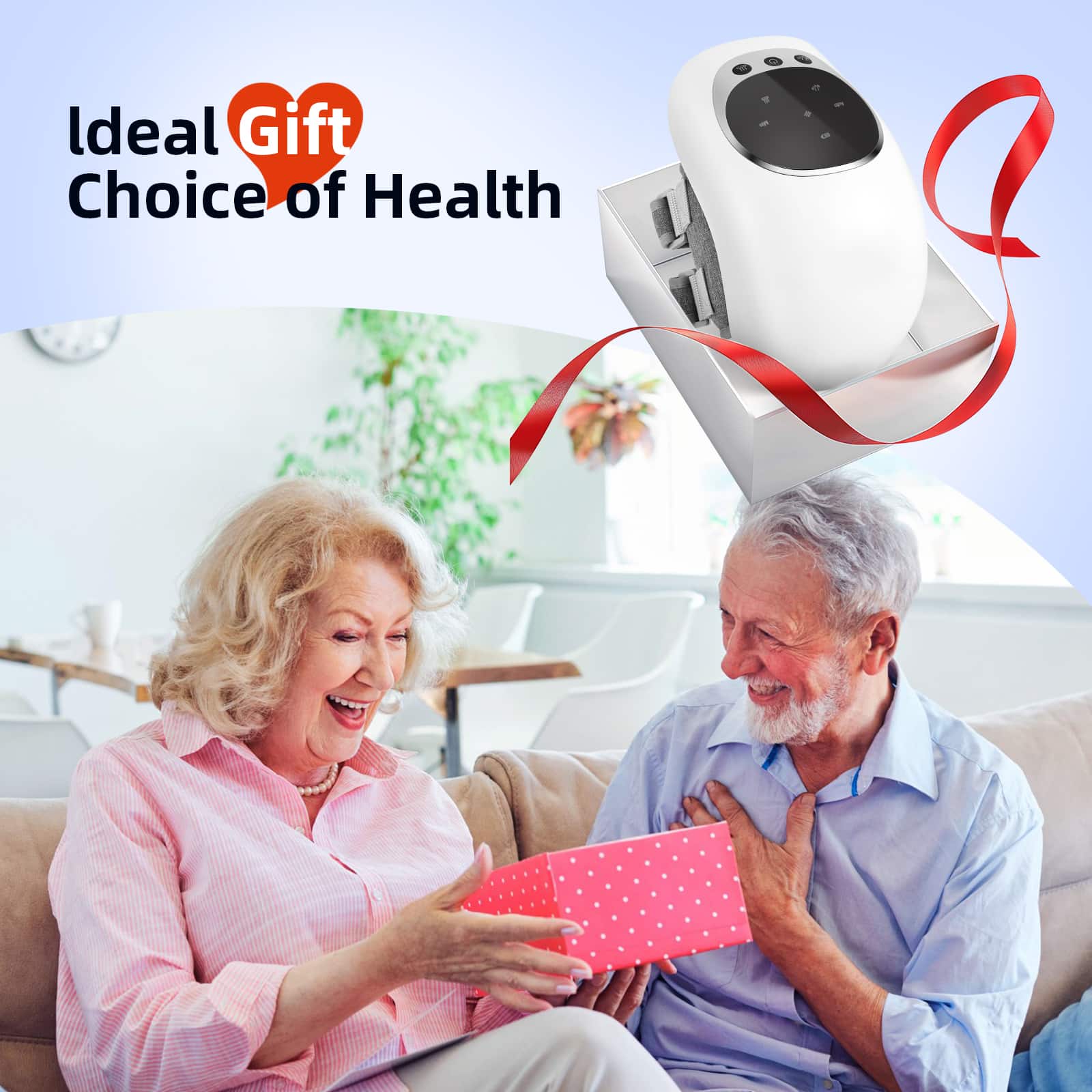 Õnnelik vanem paar istub diivanil, naine avab roosat kingikarpi, mille sees on kvaliteetne teraapiaseade liigeste probleemidele, tagaplaanil valgusküllane tuba ja taim, paremal ülal seadme suurendus koos punase paelaga.