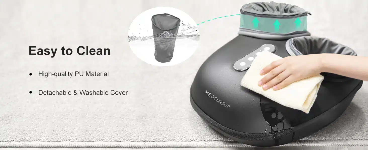 Käsi pühib musta Lõõgastav soojendusega Shiatsu jalamassaažimasinat, millel on kvaliteetne PU materjal ja eemaldatav, pestav kate, asetatud helehallile vaibale.