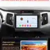 Android autoraadiod GPS ja WiFi KIA Sportage (2010-2016) 2DIN | E-pood Tootemaailm Android autoraadio GPS ja WiFi KIA Sportage (2010-2016) 2DIN kuvaga auto armatuurlaual, millel on esile toodud helikvaliteet ja värviline ekraan. Taevasina ja oranži päikeseloojangu pilt eredas vaates vasakul ning kaunis heliväljundiga subwoofer paremal all.