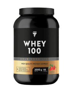 Mustas purgis Valgupulber TREC GOLD CORE LINE WHEY 100 STRAWBERRY 2000g, millel on kuldne silt ja maasika kujutis, seisab valgel taustal.