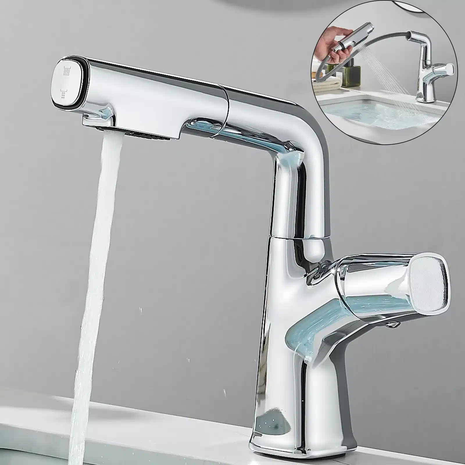 Kroomitud köögisegisti reguleeritava väljatõmmatava otsikuga, mis voolab veega, minimalistlikus kaasaegses köögiseades hallil taustal.