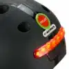 Kiiver MELON E-Series, Black Ice (XL) musta värvi läikiva viimistlusega, millel on punane LED-valgus, mustad ventilatsiooniavad ja stiilne disain linna jaoks.