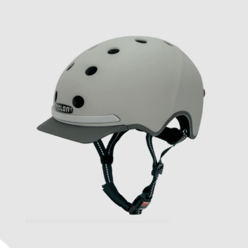 Hall Kiiver MELON E-Series, Metropolis (M/L) minimalistliku ja stiilse disainiga, ventileerimisaukudega ülaosas ja kinnitusrihmaga, mis tagab turvalise sobivuse linna liikluses.