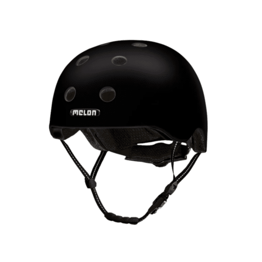 Kiiver MELON Closed Eyes (XL) musta värvi, elegantse ja minimalistliku disainiga, millel on kaitsvad ventilatsiooniavad ning vastupidav rihm, ideaalne linnakasutuseks.