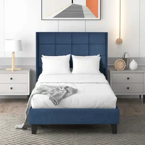 Polsterdatud voodi sinine 90x200 cm koos vedrumadratsi ja valgete voodipesudega, paiknedes modernses magamistoas, mida täiendavad öökapid ja seinal kunstiteos.