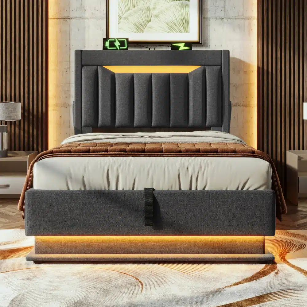 Kaasaegne voodi pesukastiga, USB ja LED valgustusega, suurusega 90x200, hallikas toonis raam ja elegantse taustvalgustusega raam üle vaipkattega põranda.