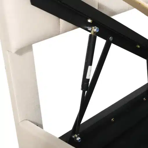 Voodi panipaigaga 90x200, hele reguleeritava peatssüsteemiga, mis näitab musta metallist mehhanismi ja helebeežist polsterdatud raamiga tausta.