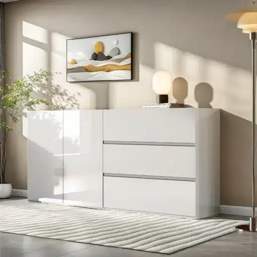 Stiilne kapp LED-valgustusega, valge läikiva viimistlusega, esitleb kahte ust ja kolme sahtlit avaras ja valgusküllases toas halli seina taustal.