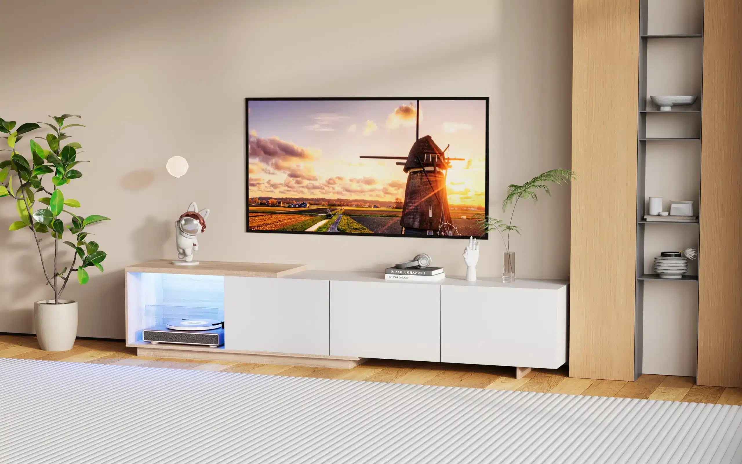 Kena must TV-alus LED valgustusega, millel on kolm sahtlit ja mõõdud 240x38x44 cm, harmoneerub kaasaegselt sisustatud elutoaga. TV-alus on paigutatud helepuust põrandale neutraalse beeži seina ees.