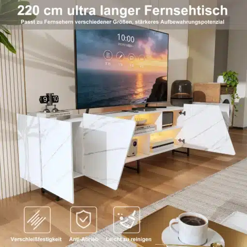 Tv-alus LED-valgustusega, valge marmoriefekt, 220 cm. Suur valge alusepind imiteerib marmorit, millele paigaldatud erinevad seadmed ja ekraan. Aluse ümbermõõdus LED-valgustus loob kaasaegse atmosfääri. Ruumikas ja funktsionaalne, sobib igasse elutuppa.