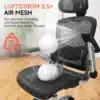 Kvaliteetne kontoritool ergonoomiline must reguleeritav, millel on õhuline võrgust kattega iste ja seljatugi, asetatud heledale puitpõrandale potitaime lähedal.