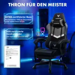 Mänguritool jalatoega ergonoomiline seljatoe padjaga, musta ja halli värvi, tugeva konstruktsiooniga, sinise valgusega taustal.