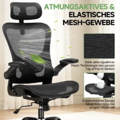 Kontoritool ergonoomiline võrkpehmendus reguleeritava peatoega, mustast õhku läbilaskvast materjalist. Tool seisab heleda tausta ees, rõhutades selle klanitud ja kaasaegset disaini.