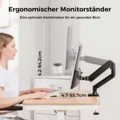 Valge ja must reguleeritav monitorihoidik, mis toetab 13–32-tollist ekraani, asetatud puidust lauale kaasaegses kontoris. Ekraan on ideaalses silmakõrguses, taustal neutraalsed toonid, seadistatud ergonoomika parandamiseks.