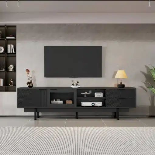 Tv-alus must minimalistlik 200x40x50,5cm, 2 sahtlit | E-pood Tootemaailm Stiilses elutoas paiknev must minimalistlik Tv-alus mõõtmetega 200x40x50,5cm, mille peal on dekoratiivsed esemed ja televiisor. Alusel on kaks sahtlit ning see on valmistatud kvaliteetsest materjalist, sulandudes ideaalselt modernsesse interjööri.