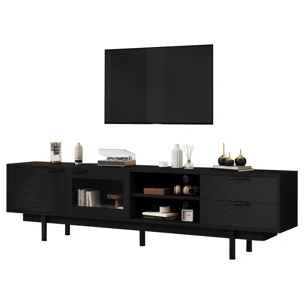 Must minimalistlik TV-alus mõõtudega 200x40x50,5cm, millel on kaks sahtlit ja avatud riiulid. Valmistatud siledast mustast materjalist, sobib ideaalselt modernsesse elutuppa. Tagaplaanil valge sein, mis rõhutab konstruktsiooni puhast joont.