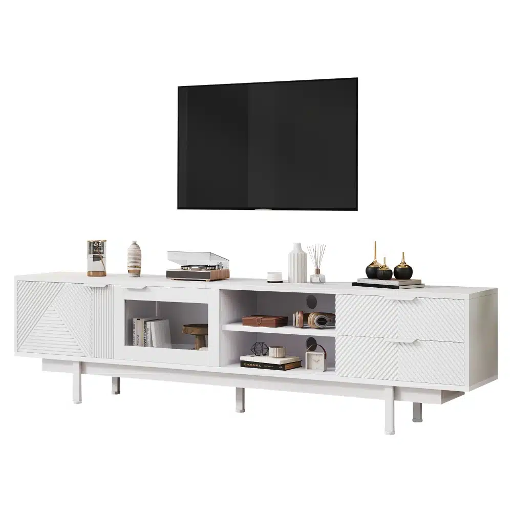 Toas valge minimalistlik TV-alus koos dekoratiivesemete ja raamatutega riiulitel, moodustades elegantse osa nüüdisaegsest elutoa sisustusest.