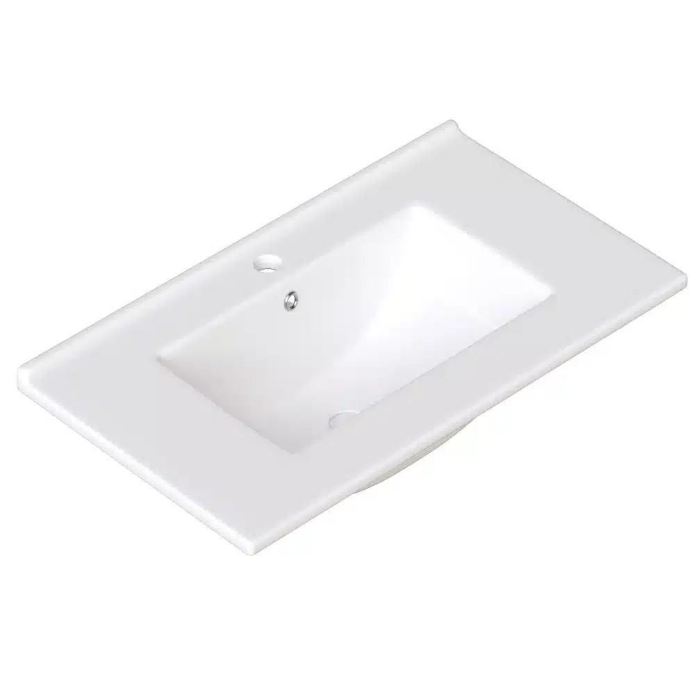Valge keraamiline valamu, mis on mõeldud vannitoakapile, kolme sahtliga ja elegantses minimalistlikus stiilis.